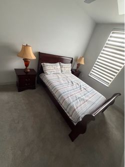 Ashley Furniture Bed with side tables (mattress not included)
