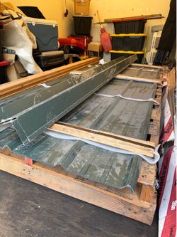 Green metal roof panels