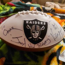 Raiders sign footbal From Phil Villapiano #41