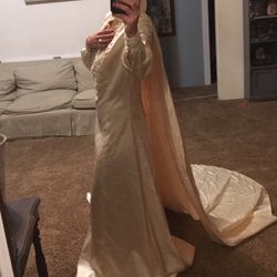 Dramatic Caped Gown