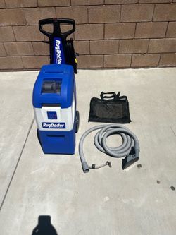 Blue & white Rug Doctor carpet cleaner