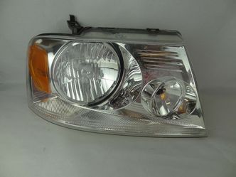 Ford F 150 04-08 passenger headlight