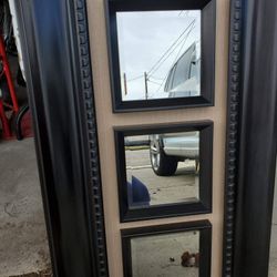 Dark brown wall decor mirror