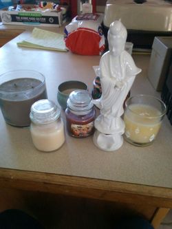 Candle,s and japanese woman statue