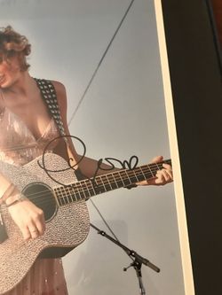 Taylor swift signed and authenticated poster with frame