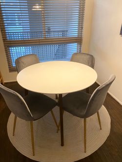 White Round Mid-Century Dining Table and Chairs