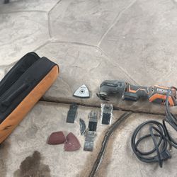 Ridgid JobMax oscillating multi-tool with several accessories. 