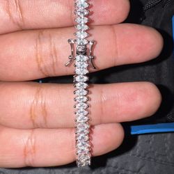 White cubic zirconia rhodium over sterling silver bracelet (size 7.25)