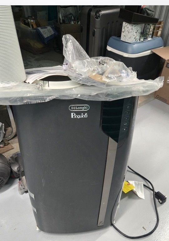 Air Conditioner
Portable Air Conditioner 
Delonghi Pinguino
Model PAC EX370LN-6AL

 3-in-1 Portable Air Conditioner  dehumidifying and fan modes. wash
