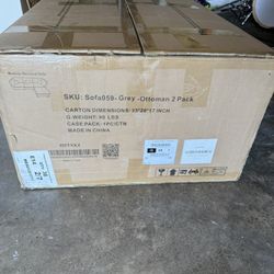 Two Grey Ottomans