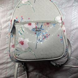 guess backpack with beautiful flowers
