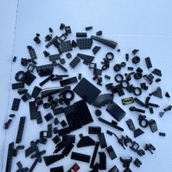 182 Black Lego parts and pieces. Clean and Sanitized
