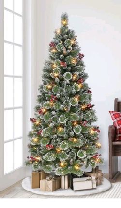 Nee 6.5 ft pre lit glittering frost slim pine tree/ Hablo Español