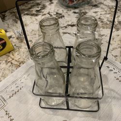 Small Black Metal carrier with Four Glass Bottles