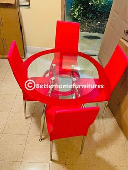 Round Glass Dining Table with 4 Red Chairs
