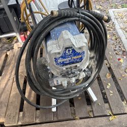 Graco Magnum ProX19 airless paint sprayer.