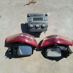 TOYOTA CAMRY OEM RADIO /AC CONTROLS , SIDE MIRRORS, TAIL LIGHTS EVERYTHING IS IN GOOD CONDITION  THEY'LL FIT 07 AND UP ASK FOR PRICES