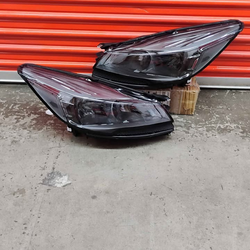 Pair of headlights with smoked housing and clear corners compatible with Ford Escape 2013-2016