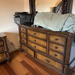 Queen-size bed set for sale Includes: • Queen-size bed • Dresser with mirror • Nightstand Good condition. Ready for pickup.