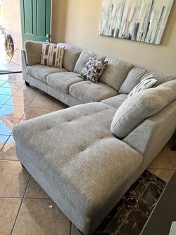 Beautiful light Grey sectional couch from Jerome’s LIKE NEW