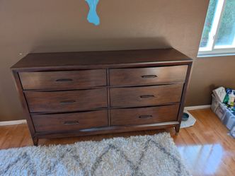 Matching bedroom set. Queen bed frame, 2 bedside lockers and 2 dressers