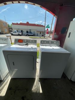 Top load washer and dryers