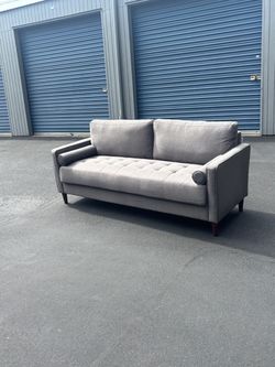 Mcm tufted sofa