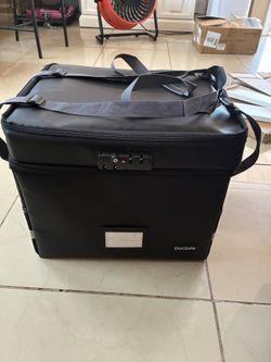 DocSafe branded fireproof document storage bag designed to hold letter or legal …