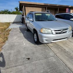 05 TRIBUTE 4k OBO Or Trade For Equal Value Pickup