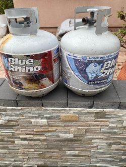 2 empty propane tanks