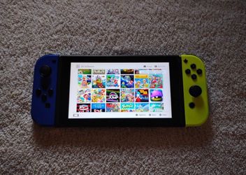 NINTENDO SWITCH V2 With 100 POPULAR SWITCH GAMES