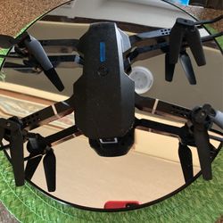 Brand New Drone  With camera in an app And example of a spinning table runs on the battery put your drone on top and see if Mira and spends It Cool