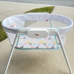 Fisher-Price bassinet for sale.