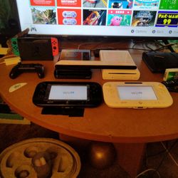 Nintendo Switch And 2 Wiius