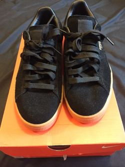 Black puma suede