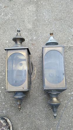 Old school outside light fixtures has patina