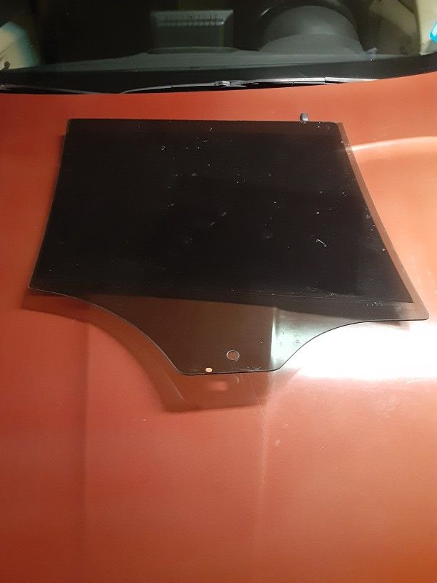 BMW X3 rear driver glass tinted Window