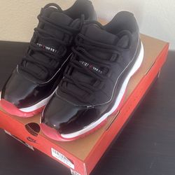 Air Jordan 11 Retro Low red breds