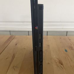 PS2 Slim with 2 DualShock 2 Controllers