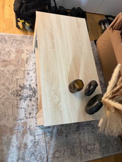 Coffee table with lift top storage