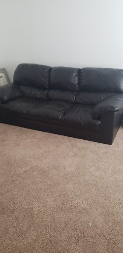 Black leather sofa for sale asap