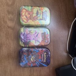 Pokemon Mini Tins Prismatic and Mega