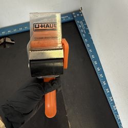 U-Haul tape gun dispenser