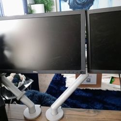 2 Dell Computer Monitors With Adjustable Hook On Arms