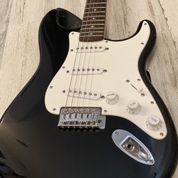 Squier By Fender Strat Electric guitar $300