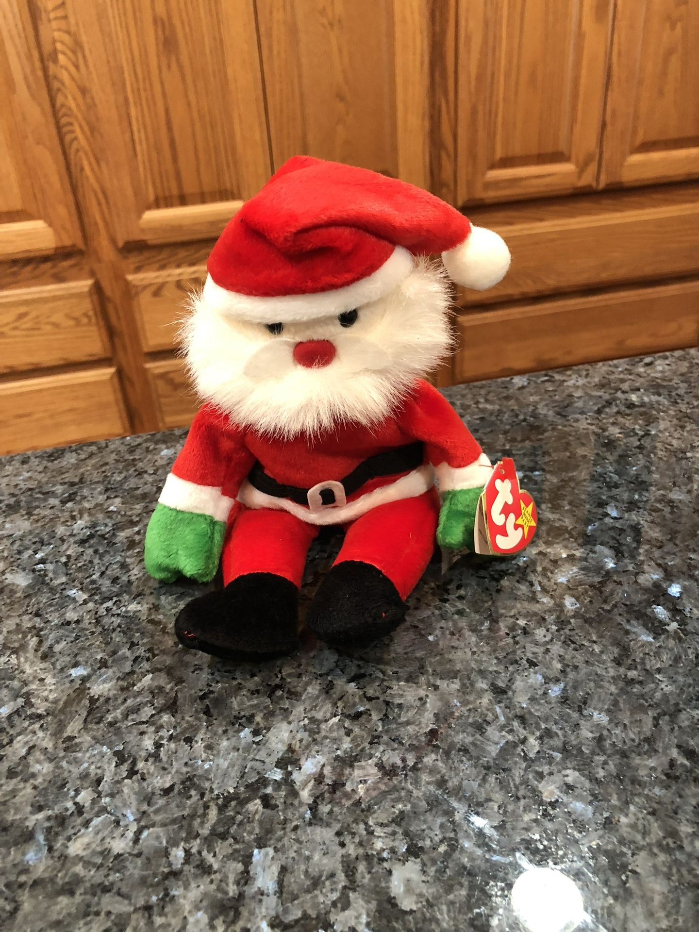 Vintage 1998 TY Beanie Babie “Santa”. Size approximately 9 inches tall. Brand new with tags.
