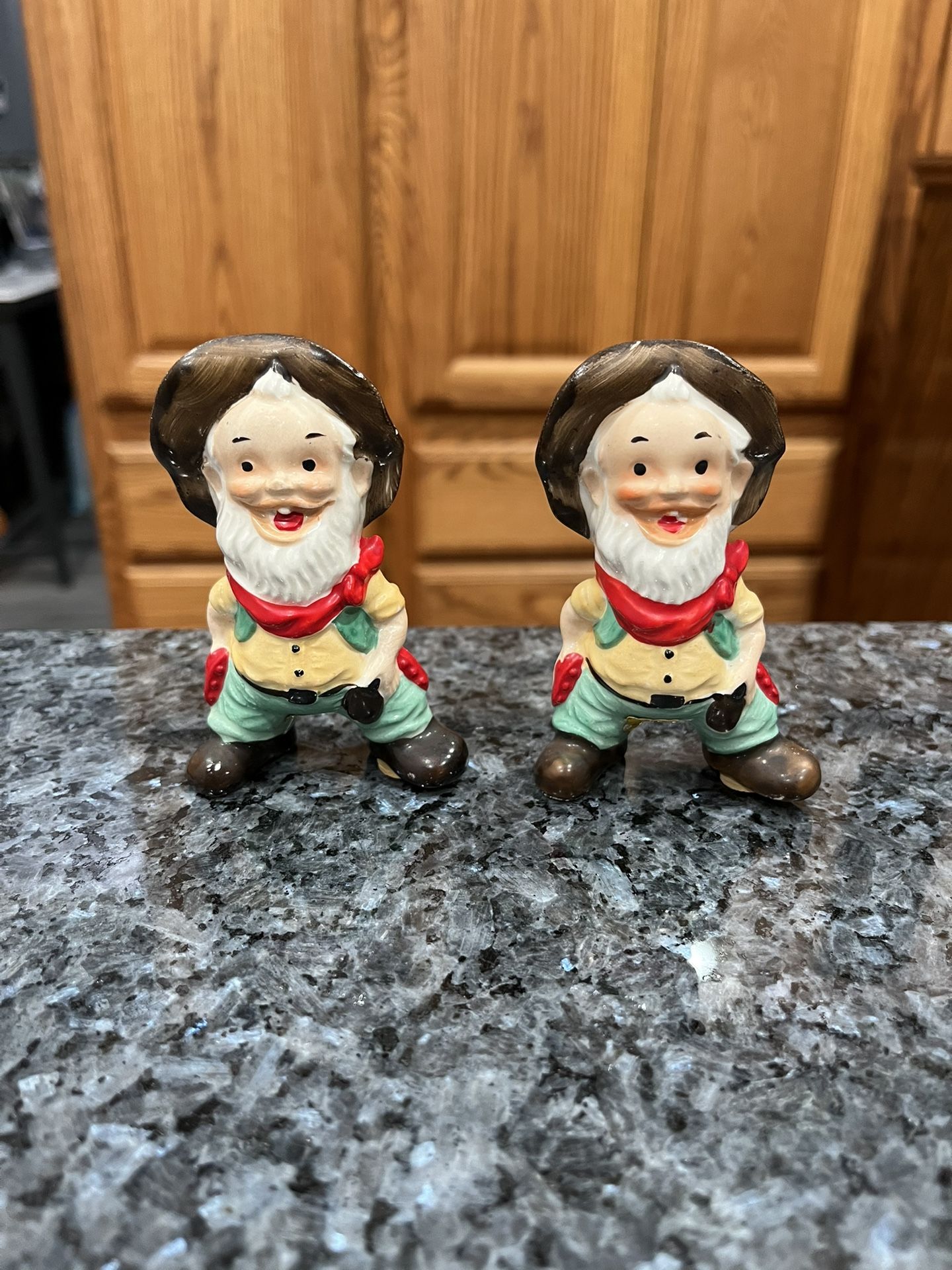 Vintage Ceramic cowboys Pair of Salt and pepper shakers. Size approximately 3 1/2 inches tall. Made in Japan with stickers. Preowned