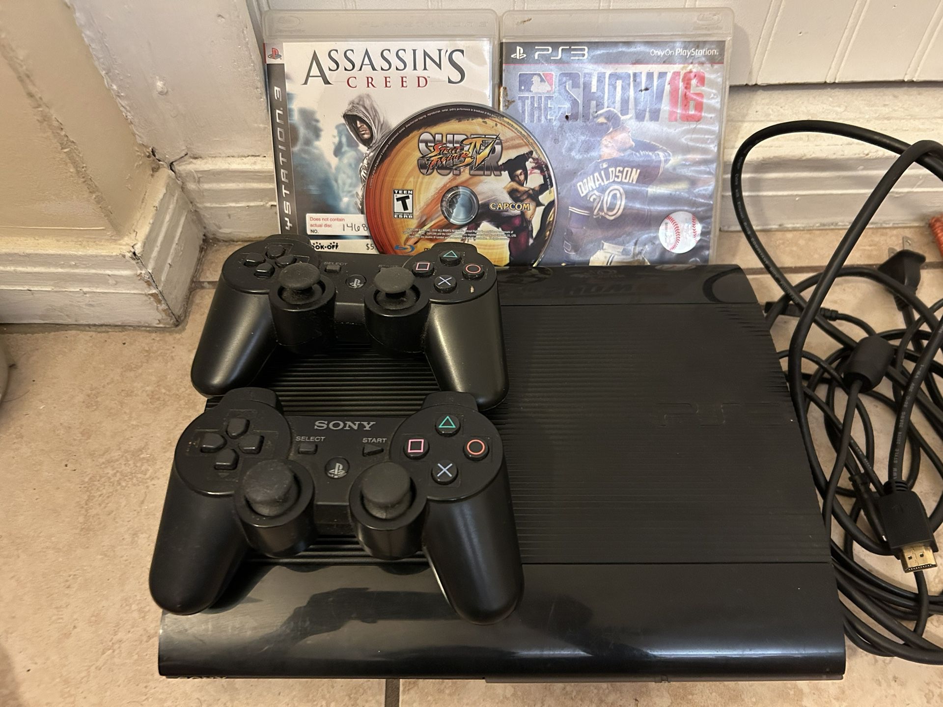 PS3 (Comes with 3 Games and 2 Controllers)