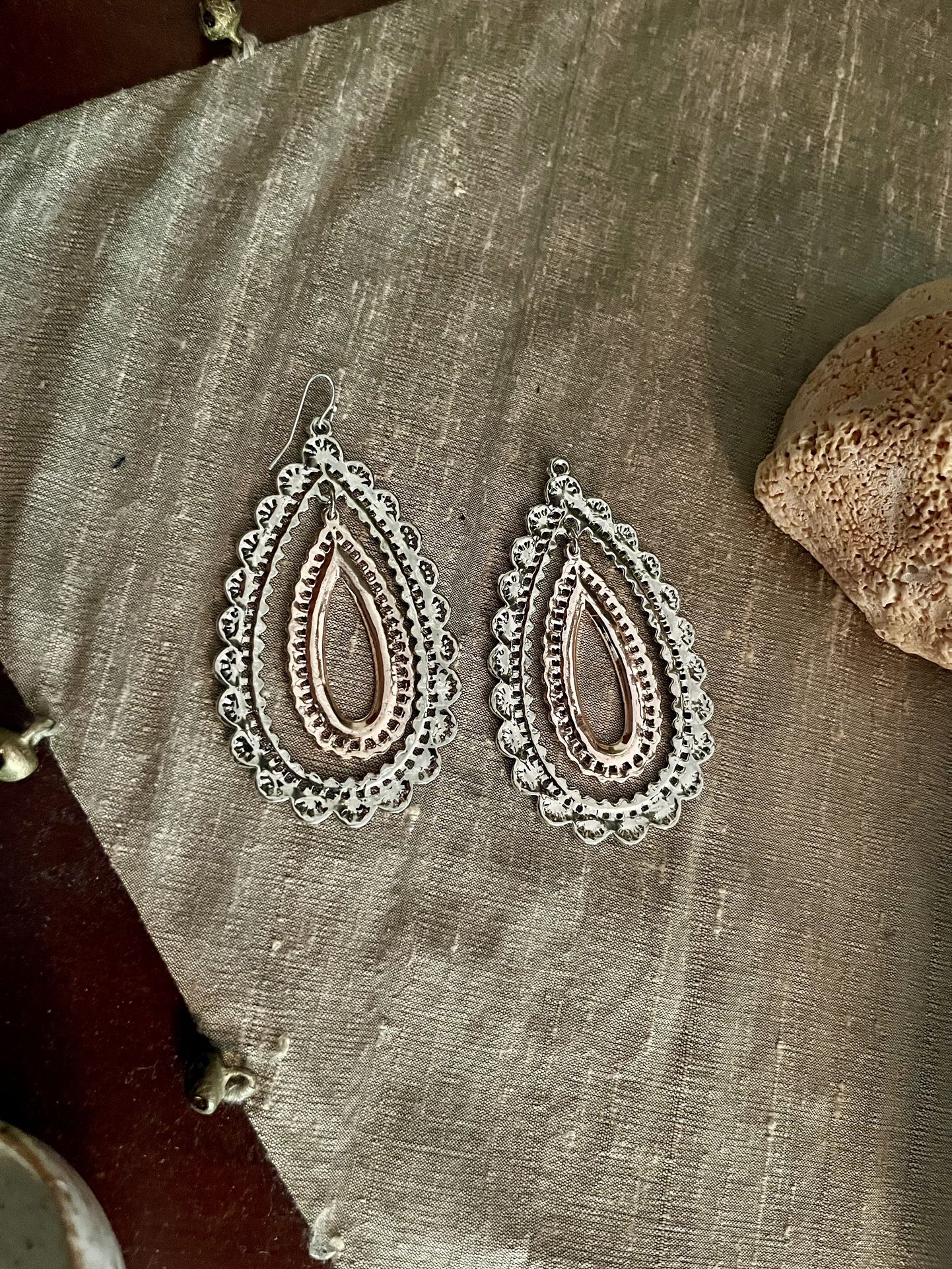 striking large shiny silvery, coppery, and diamond teardrop earrings