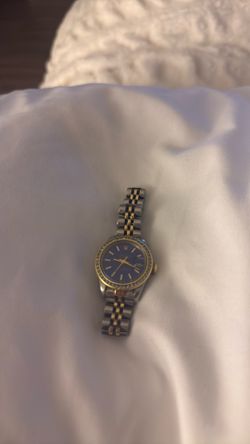Two Tone Gold And Stainless Rolex With Blue Lapis Face. Two Bezels Diamond And Gold Original Box And Paperwork. 